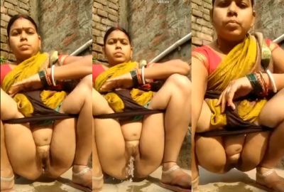 Nude Bhabhi pisses outdoors and records MMS