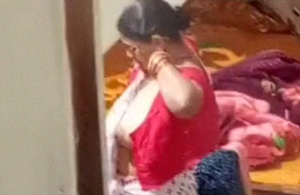 Aunty caught on hidden cam while dressing video