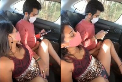 Young couple enjoys outdoor sex in van